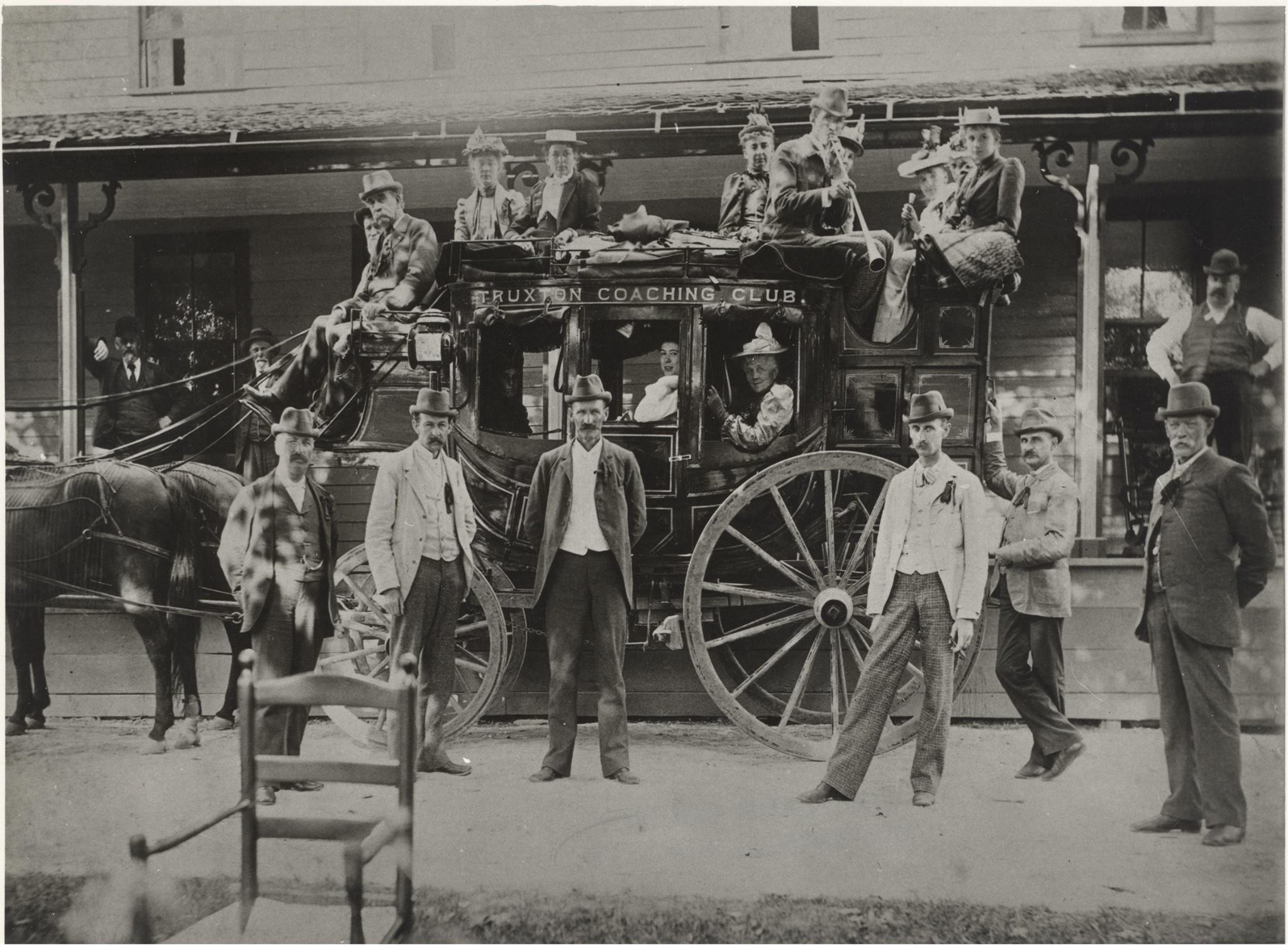 Cortland Stage Coach with many men in women in old fashioned clothes.